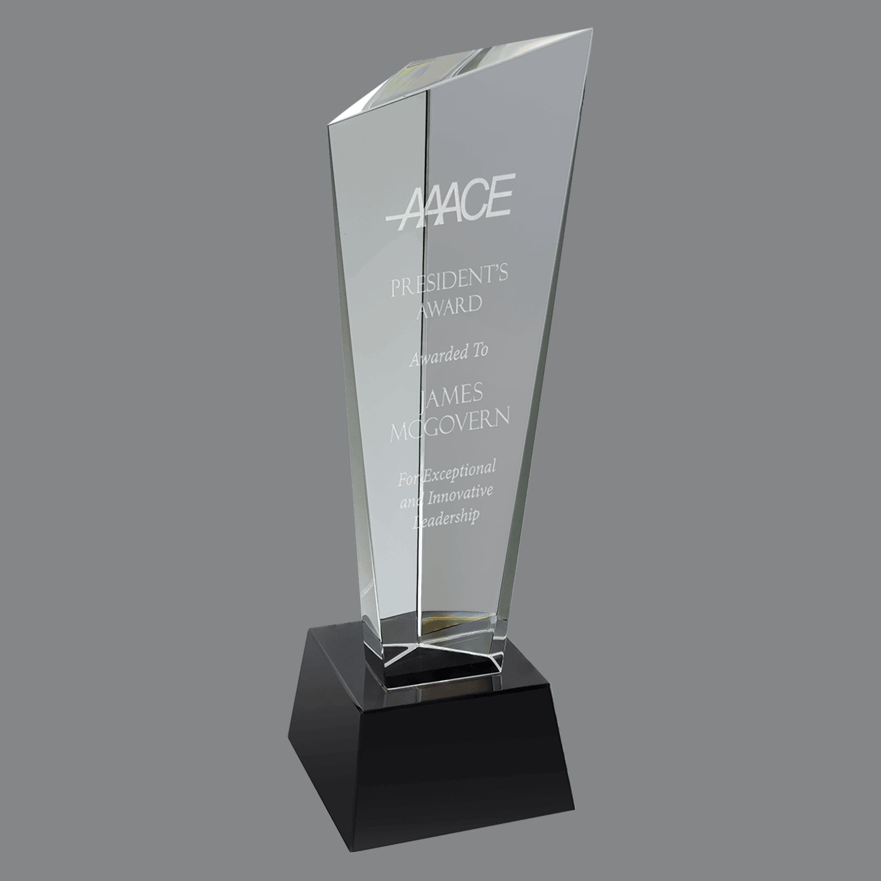 Our Rising Peak Crystal Award features a clear piece of crystal for laser engraving personalization. One side rises higher than the others, giving the award the rising peak look. It's mounted on a black crystal base. This CRY23010L stands 11" tall, weighs 5.6 lbs & comes in a deluxe gift box.