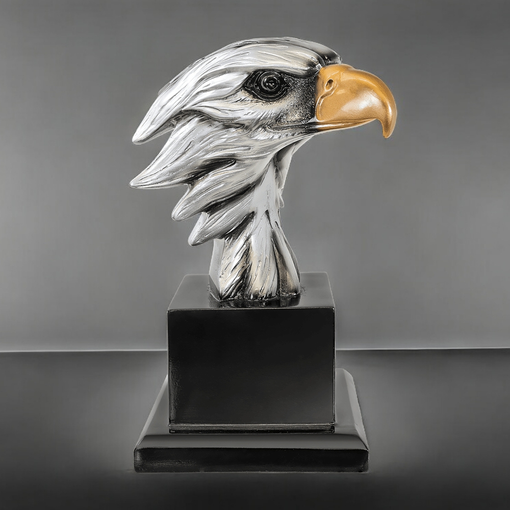 Our Silver Eagle Head on Black Base turned to the right so that you can see the other side. It features a silver eagle with a gold beak mounted on a wood base.