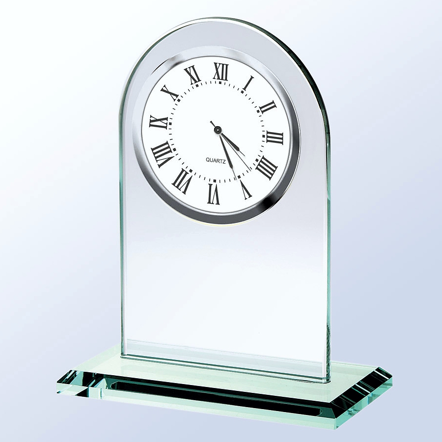 Our Arched Glass Clock with a White Face has a rounded top and a white clock face with black roman numerals. Below the clock is a blank place for laser engraving personalization. It's all mounted on a glass base. This GC007 is 6" x 7.25" in size, weighs 1.8 lbs and includes free engraving.