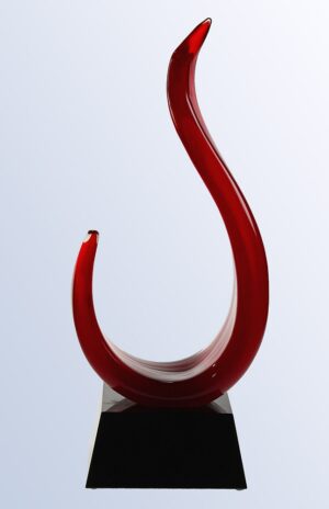 Our Red Jay Art Glass Award features a glass piece hand blown in the shape of the letter J in a red color. It's mounted on a black glass base that includes an engraving plate for personalization, but not shown in this photo. This G1609 art glass award is 12" tall & weighs 5.8 lbs.