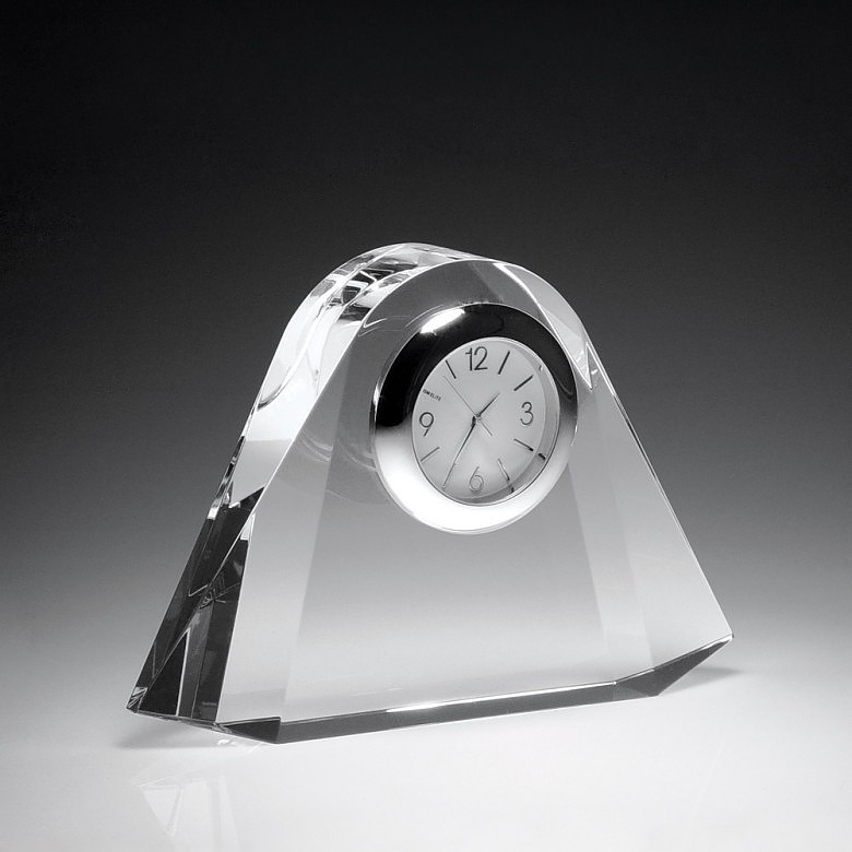 A crystal clock with the outline of the arch of a rainbow. It has a white face clock with a silver bezel at the top and a blank area for laser engraving personalization.