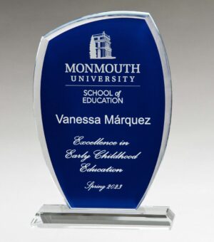 Our Blue Tidal Glass Award features a blue glass piece with a slanted top. It can be laser engraved for personalization and it will come through a frosted white color. It's mounted on a clear glass base for stability. It comes in 3 sizes to choose from, all of which include free engraving & a deluxe gift box.